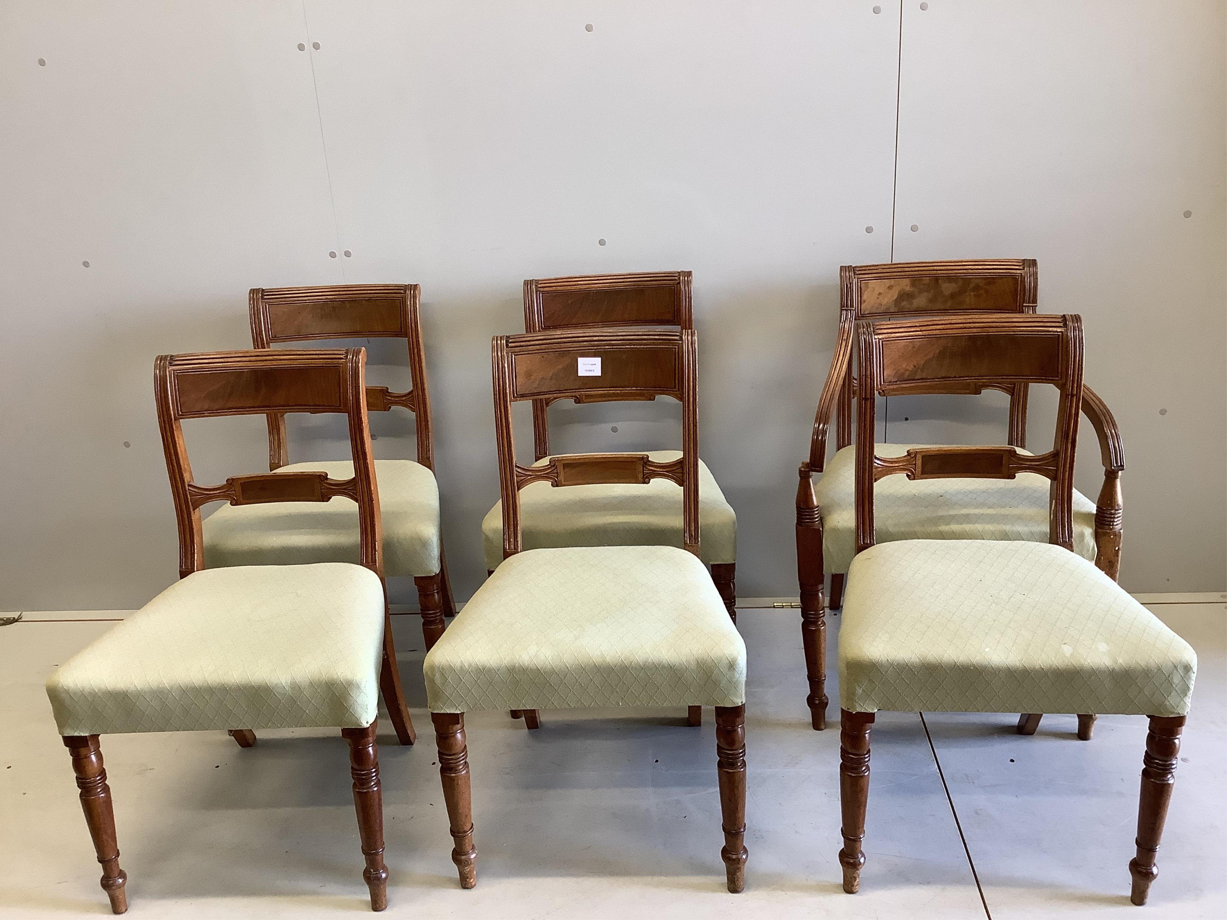 A set of six Regency mahogany dining chairs, one with arms. Condition - fair